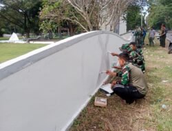 Pemkab Aceh Besar dan Prajurit Kodim Hapus Vandalisme di Pagar Kuburan Massal