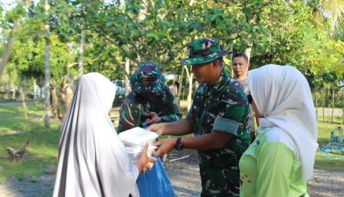 HUT TNI ke-80, Yonif 117/KY Tebar Manfaat Lewat Bakti Sosial di Aceh Besar