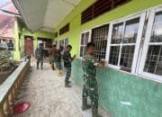 Rusak Diterjang Banjir, Prajurit Yonif 899 Renovasi SDN 1 Tualang Cut
